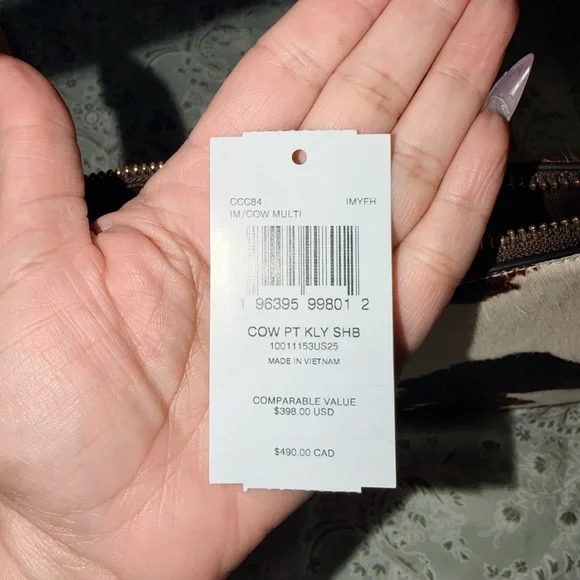 Coach Kailey Shoulder Bag
With Cow Print And Tassel - Picture 7 of 10